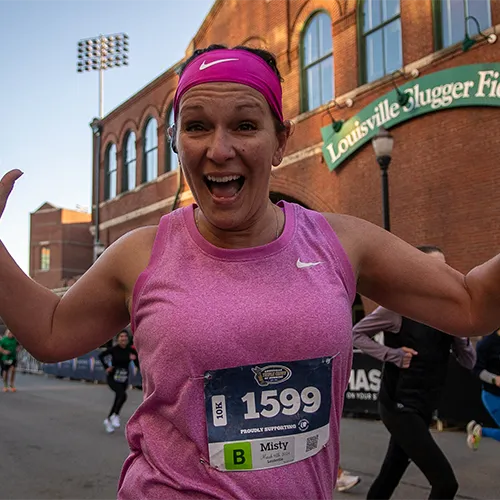 woman in all pink near Louisville Slugger Field