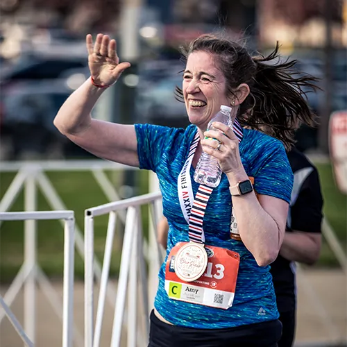 woman post race high five